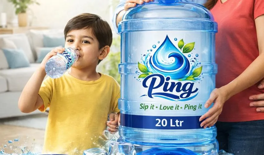 Child drinking Ping water next to a 20 litre Ping jar